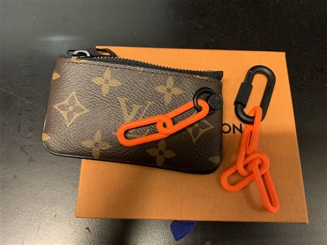 louis vuitton lock and key price|louis vuitton keychain pouch.